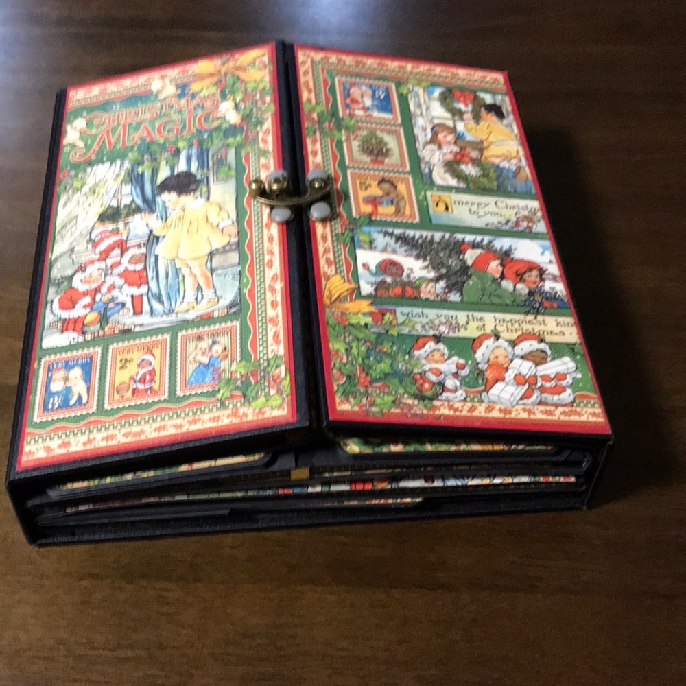 Christmas Magic memory album 8 1/2”x 8 1/4” with a 2” spine.